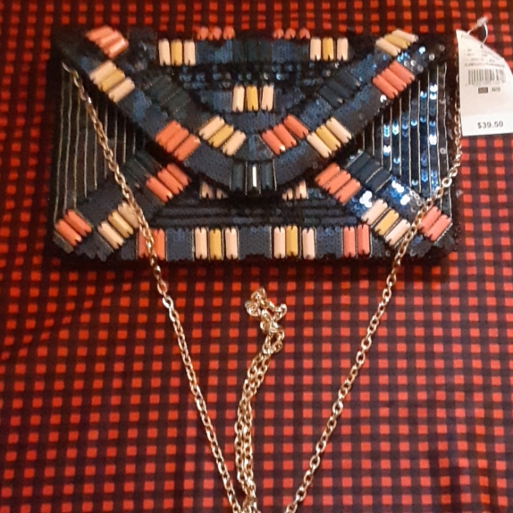Envelope purse with gold chain handle